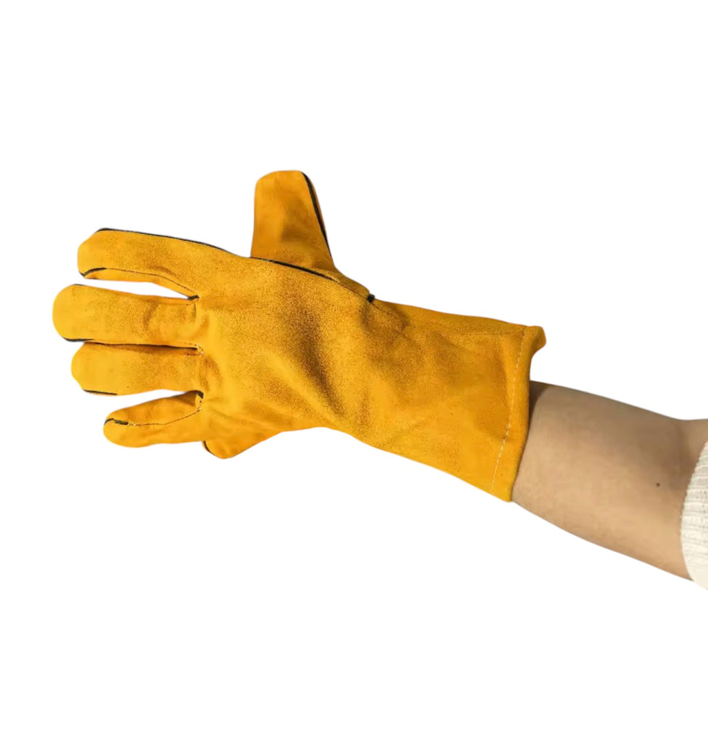 Yellow cowhide glove showing fit and extended cuff
